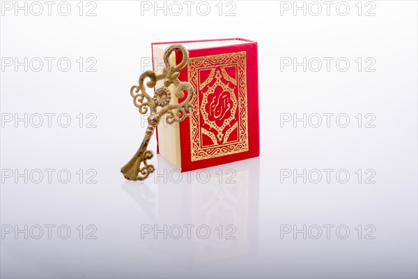 Retro Key and Islamic Holy Book Quran in mini size