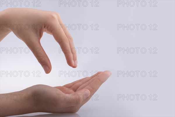 Hand holding on a white background