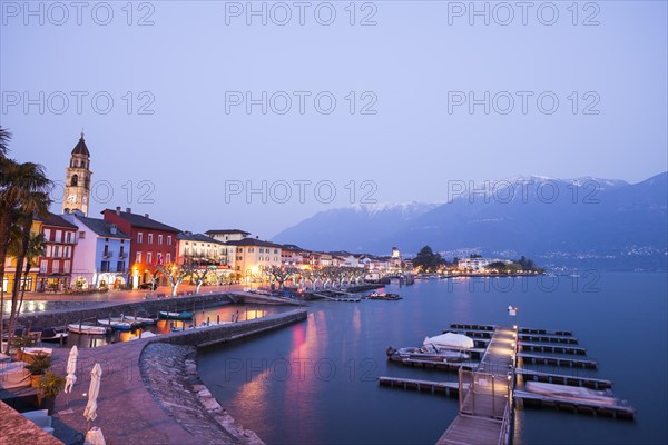 Ascona Village with Mountain and Alpine Lake Maggiore in Dusk in Ticino
