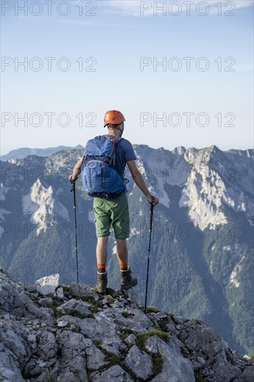 Mountaineer on a ridge path