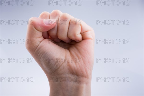 Clenched fist on a white background