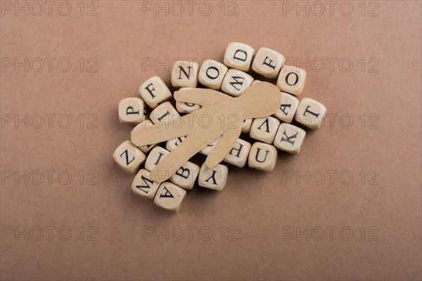 Paper man and letter cubes of made of wood