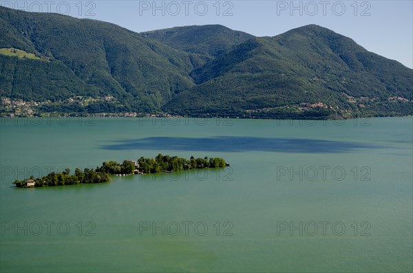 Aerial View over Brissago Islands with a Shadow of a Cloud and Mountain over Alpine Lake Maggiore in Ticino