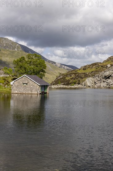 View over the lake with boathouse