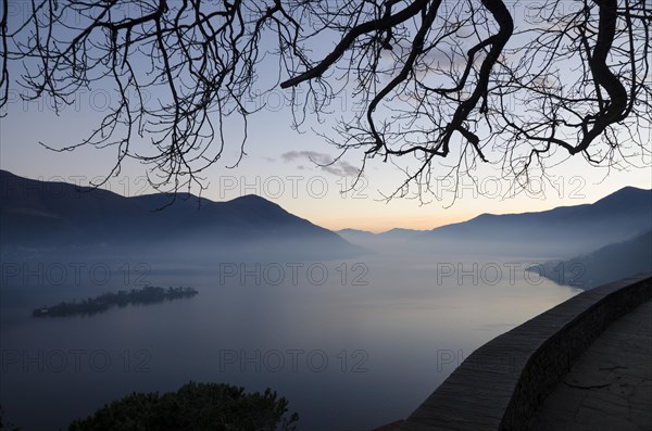 Alpine Lake Maggiore in Dusk with Brissago Islands and Mountain in Ticino