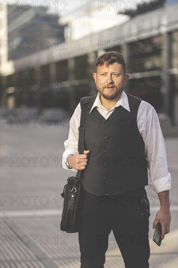 Business man posing on the street