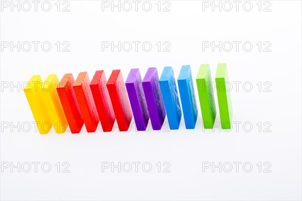 Colorful Domino Blocks in a line on a white background