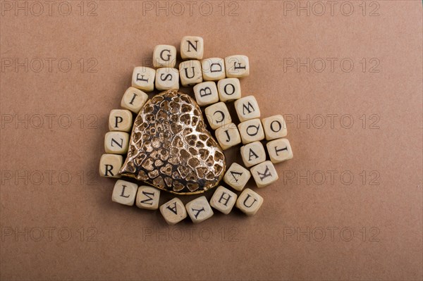 Metal Love icon and Letter cubes of made of wood