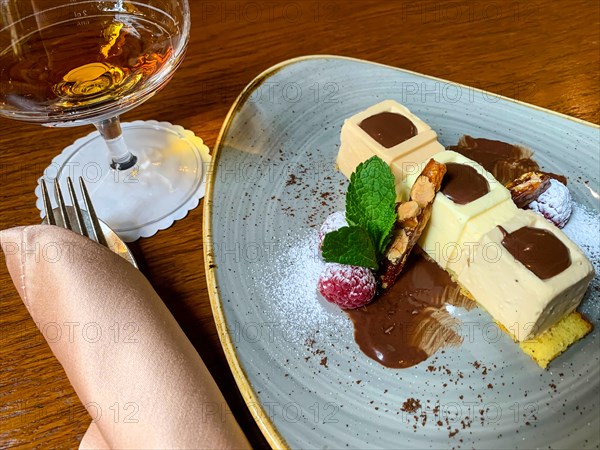 Modern Design of a Tiramisu and Glass with Brandy