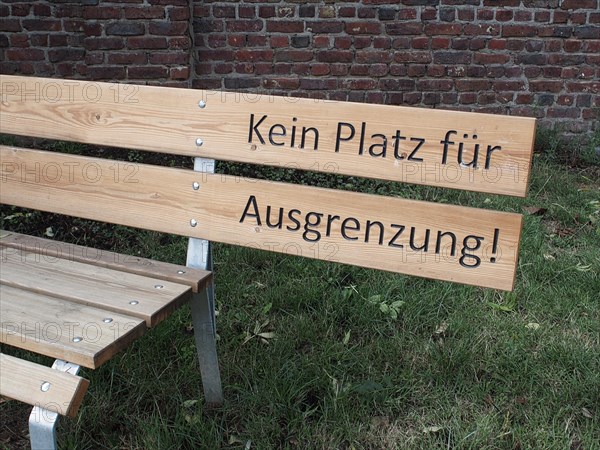 Bench with inscription Kein Platz fuer Ausgrenzung