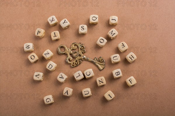 Letter cubes of made of wood around retro key