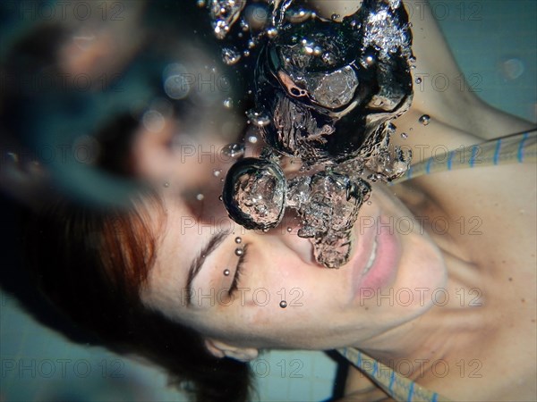 Woman Underwater with Bubbles. | MR:yes Maria-IT-29-04-2019