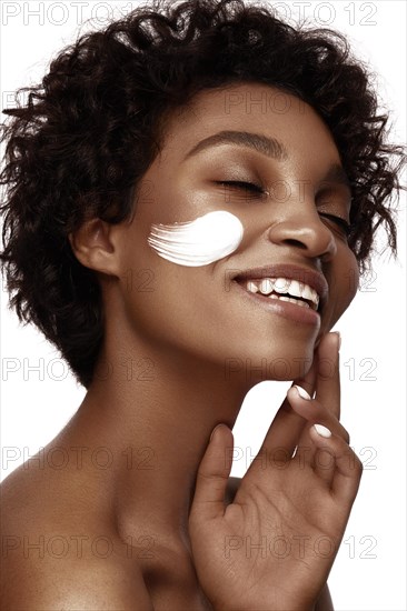 African American skincare models with perfect skin and curly hair. Beauty spa treatment concept