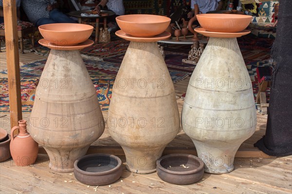 Ancient metal jug in oriental style in view