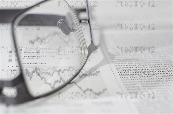 Financial Newspaper and Eyeglasses