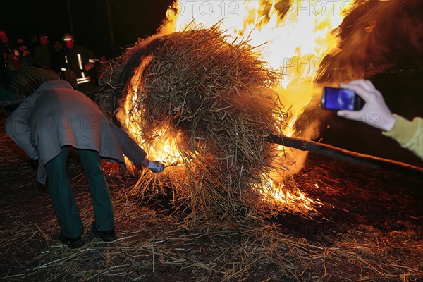 Lighting the straw