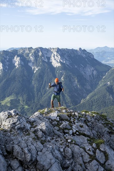 Mountaineer on a ridge path