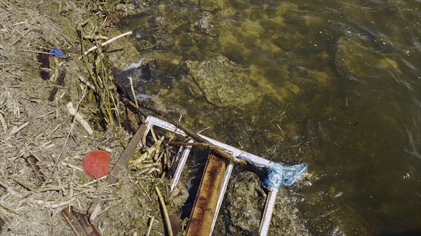 Window frame of house and other drifting debris has reached Black Sea beaches in Odessa