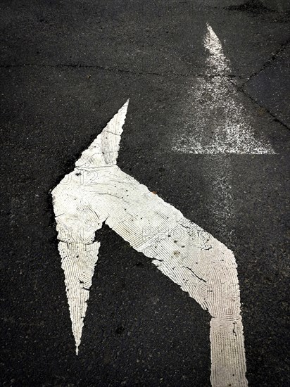 Direction arrows on macadam