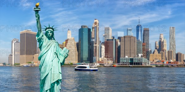New York City Manhattan skyline with Statue of Liberty and World Trade Center photo montage panorama in New York