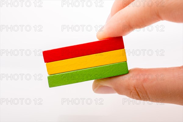 Colorful Domino Blocks in a line on a white background