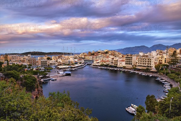 Colorful view of Voulismeni lake and Agios Nikolaos town on Crete island