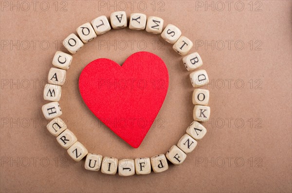 Red Love icon and Letter cubes of made of wood