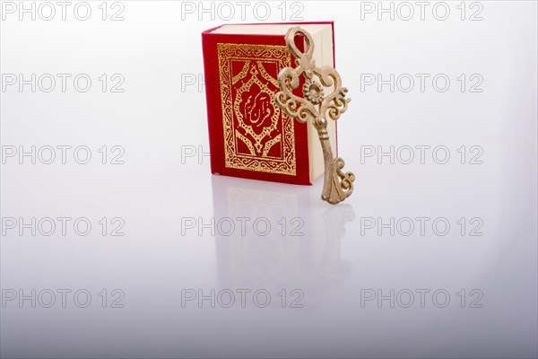 Retro Key and Islamic Holy Book Quran in mini size