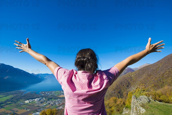 Woman with arms outstretched