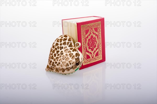 Heart shape and Islamic Holy Book Quran mini size