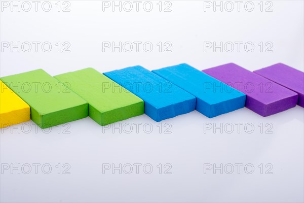 Colorful Domino Blocks placed on a white background