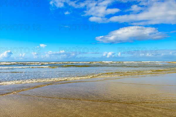 Quiet and deserted beach with small waves and clear waters in Serra Grande on the coast of Bahia