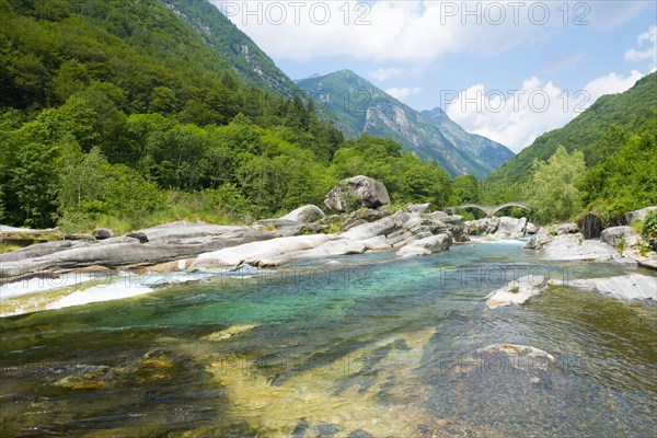 Roman Bridge Ponte dei Salti over River and Mountain in valley Verzasca in Ticino