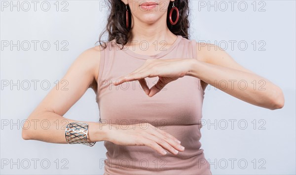 People gesturing in sign language isolated. Unrecognizable woman gesturing in sign language