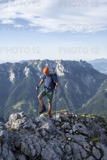 Mountaineer on a ridge path