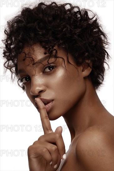 African American skincare models with perfect skin and curly hair. Beauty spa treatment concept