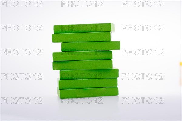 Colorful Domino Blocks in a line on a white background