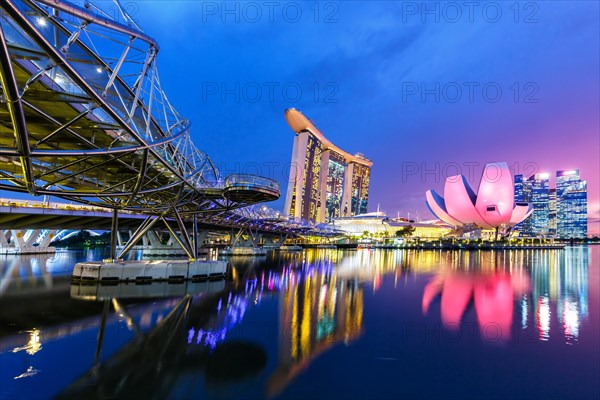 Marina Bay Skyline and Helix Bridge in the evening in Singapore