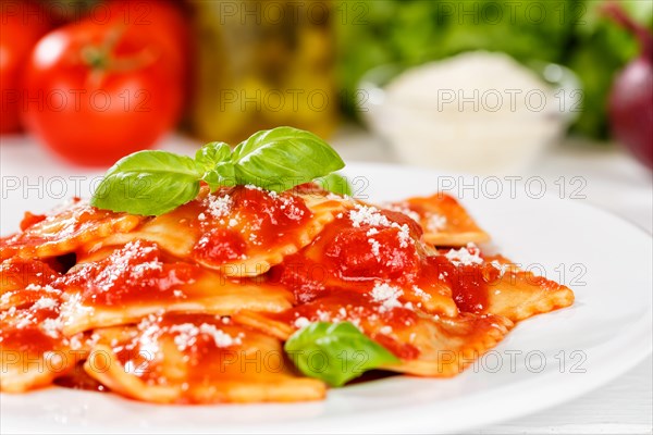 Ravioli Italian pasta in tomato sauce eat lunch dish with plate in Stuttgart