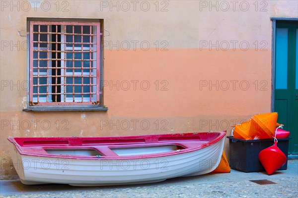 Boat on the Land Under a Window in Cinque Terre in Liguria