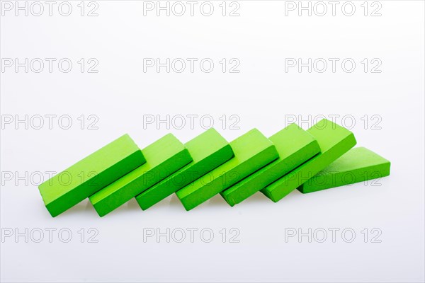 Colorful Domino Blocks in a line on a white background