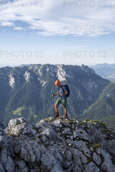 Mountaineer on a ridge path