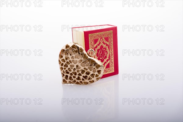 Heart shape and Islamic Holy Book Quran mini size