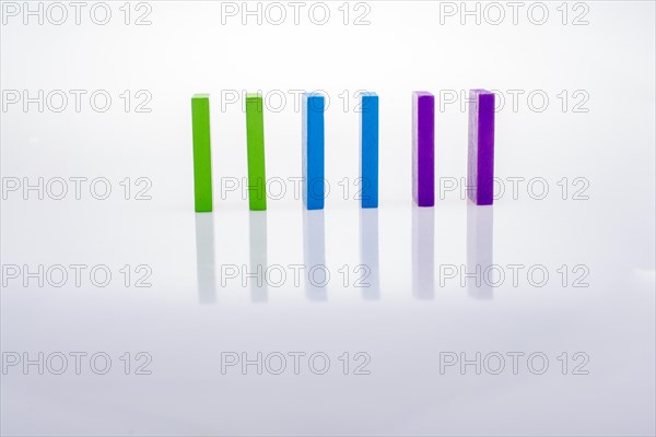 Colorful Domino Blocks placed on a white background