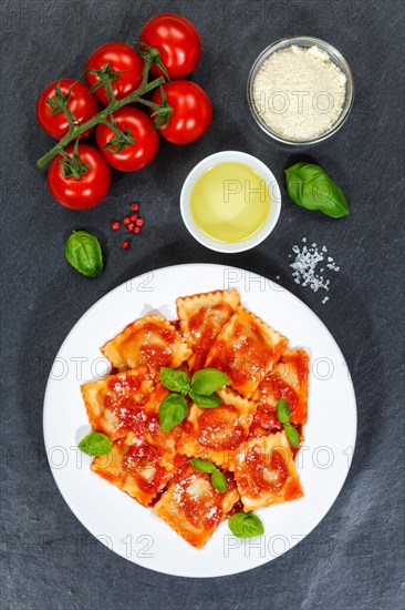 Ravioli Italian pasta eat lunch dish with tomato sauce from top of slate in Stuttgart