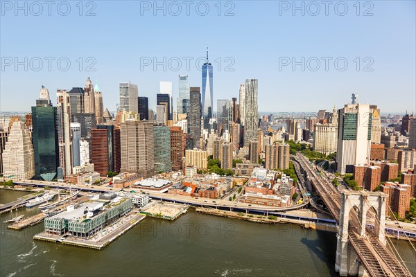 New York City Manhattan skyline with Brooklyn Bridge and World Trade Center skyscraper aerial view in New York