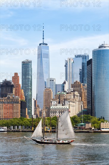 New York City Manhattan skyline with World Trade Center skyscraper and sailing ship in New York