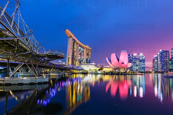 Marina Bay Skyline and Helix Bridge in the evening in Singapore