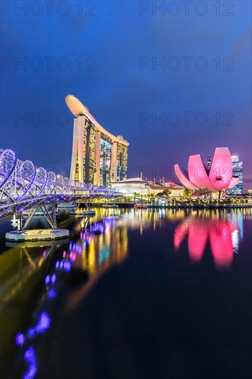 Marina Bay Skyline and Helix Bridge in the evening in Singapore