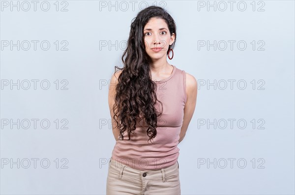 Portrait of attractive latin girl isolated. Young pretty latin girl with serene look on isolated background. Nicaraguan woman concept in isolated background